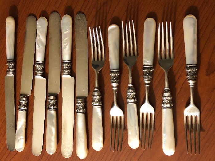  Mother of Pearl Knives and Forks  http://www.ctonlineauctions.com/detail.asp?id=684565