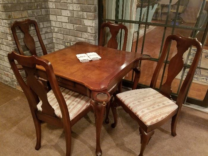 Game table w/ 4 chairs, retractable coasters and 1 drawer