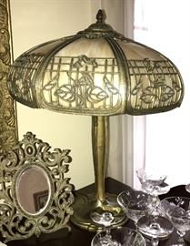 6 panel slag lamp with spelter base. Shade is in very good condition.