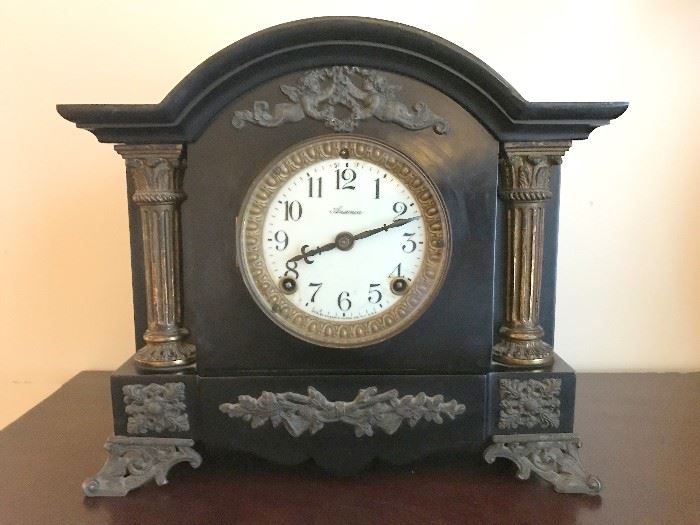 Mantel Clock, iron case w/ porcelain dial. Made 1904. 8 day Time & Strike. Great condition!