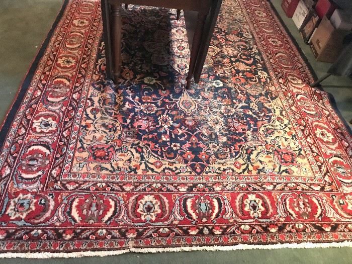 Oriental Rug - 7' X 10'2" - see photos for condition. Good colors.