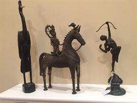 Metal and wood statues