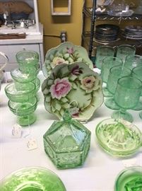 Beautifully painted plates. Green depression.