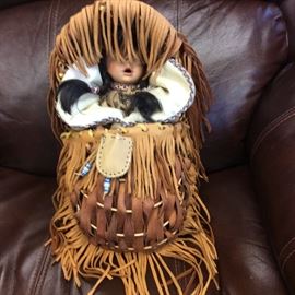 This is a wonderful leather and basket Native American Papoose.