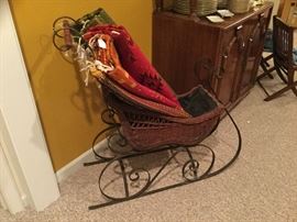 Victorian doll sleigh/colorful wool rugs