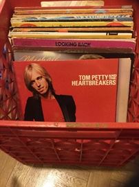 Great rock 'n roll record collection. Tom Petty, Rolling Stones, Foreigner and much more. Records are in very good condition. Shelf wear on covers.