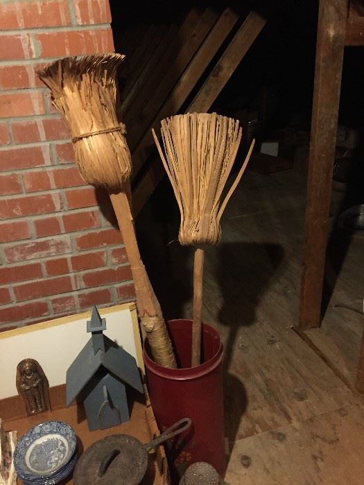 Birch brooms. birdhouse, cast iron pot