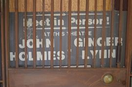 Garage , and yes, that is an original poster offering the opportunity to meet John Holmes in person!