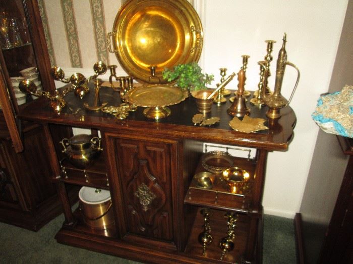Brass & other metal items sitting on SideBoard/buffet