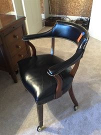 Leather chair with casters