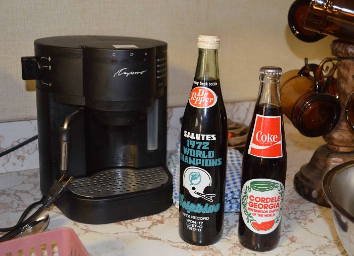 Capresso Espresso & Cappuccino machine; 1972 Miami Dolphins Dr. Pepper bottle; Cordele Georgia Coke bottle