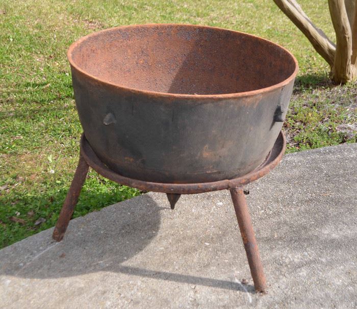 cast iron cauldron on stand