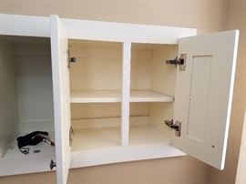 Small built-in cubby with doors