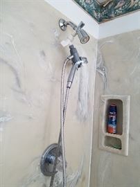 Master bath shower fixture with handheld