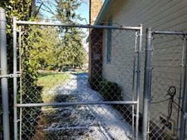 Chain link fencing and gate