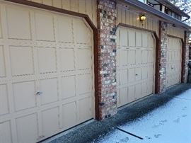 Three manual garage doors