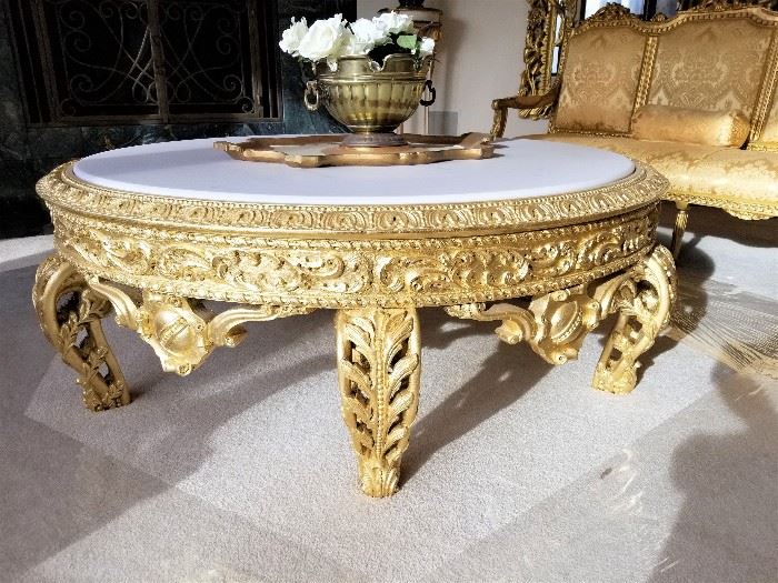 This incredible antique piece (French) began life as a European height coffee table. Painted in gold leaf, the original red marble slab and base are available as well. 