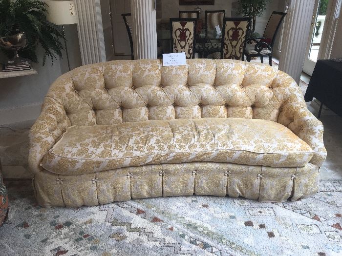 Carlton House sofa ($495); 12' by 9' area rug ($280)