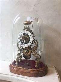 SOLD-1860s to 1870s English brass skeleton clock with glass dome