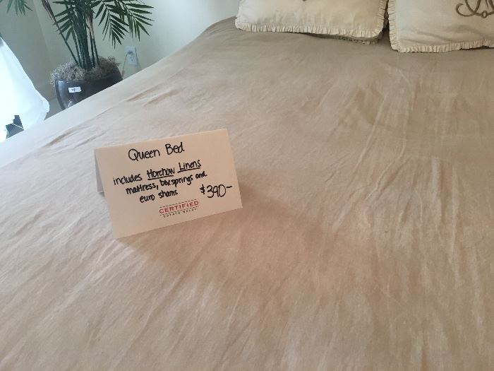 Queen bed (includes mattress and boxspring) with Horchow linens ($390)