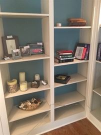 Assorted candles; frames and books