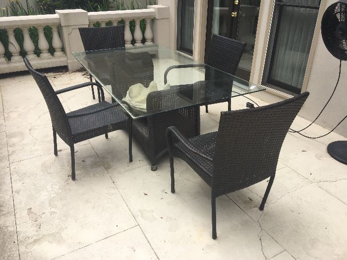 Brown Jordan Patio Table and 4-chairs (chairs are not Brown Jordan) $648; Pottery Barn formed plaster shell $95; assorted planters and pots ($28-85)