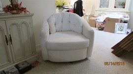 There are a pair of these club chairs