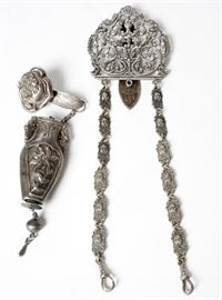 186. Two Silver Metal Belt Clips With Implements