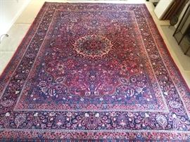 Vintage Persian Meshad rug, hand woven, 100% wool face, measures a room-gobbling 10' 6" x 13' 6".