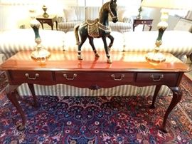 See? Here's the 3-drawer Ethan Allen mahogany sofa table that matches everything else.                                       Why not?