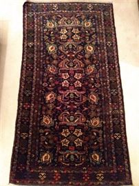 Vintage Afghan Balouch rug, hand woven, 100% wool face, measures 3' 8" x 6' 8".