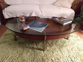 Nice oval glass/wood coffee table.