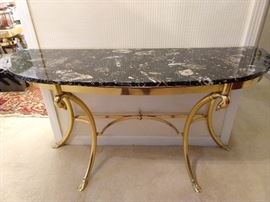 STRAIGHT out of the 1980's Dynasty TV stage set.                  Can't you just see Alexis and Krystle wrestling over this Italian brass and marble console table?