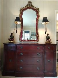 Vintage 1940's Drexel New Hampton Court buffet, with a lovely pair of blackamoor table lamps, with a very cool, vintage gilt wood mirror, with hand blown red glass surround.