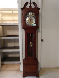 Vintage mahogany Grandmother clock that actually works, doesn't take WIC vouchers, smells nice and sings well.