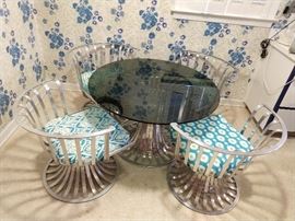 AHA! Then we have the STAR of the show!                             A vintage Russell Woodard aluminum dining table, with four matching chairs - truly a find at this sale!