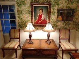 Ah, look! An original oil painting of Melodie, one of her sweet nieces. The frame is great, so buy it and rip out the Melodie!                                                                                                 Nice mahogany/tooled leather coffee table, Another Ethan Allen piece, with burled wood panels, bun feet and tooled leather top; two drawers, one on each  side.