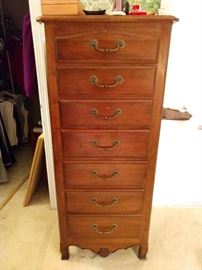 Semainier
From the French word for "week," a semainier is a tall, narrow bedroom chest with seven drawers, one for each day of the week. Designed in the 18th century, when laundry was a weekly chore at best, it kept milady's lingerie fresh and organized, after all that Greek ravaging.                                                                                              Today it's simply an attractive, tall chest with convenient 7-drawer storage, this one by Ethan Allen; matches the 5-drawer chest in the previous picture.                             
Have I put you to sleep yet?