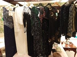 Ball gowns, some worn to the secret Policeman's Ball. Don't worry, there are beaded evening bags & clutches to match!