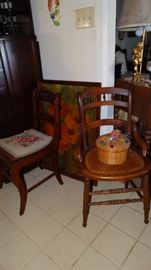 WALNUT CANE BOTTOM HOOP CHAIR. MAHOGANY SABER LEG CHAIR WITH CANE BOTTOM.