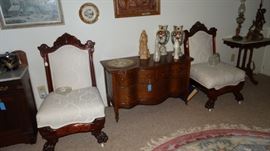 1910 UPHOLSTERED SIDE CHAIRS WITH CLAW FEET. OAK SERPENTINE TWO DRAWER CHEST. PAIR OF BRISTOL PORTRAIT VASES, PAIR OF MURANO BOTTLES.