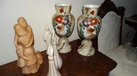 CLOSE UP OF BRISTOL GLASS PORTRAIT VASES, MURANO BOTTLES.