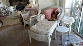 WICKER LOUNGE CHAIR AND OVAL RAG RUG