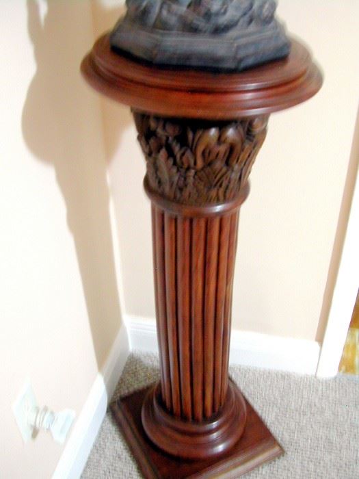 Solid wood pillar, handcarved. Very heavy.