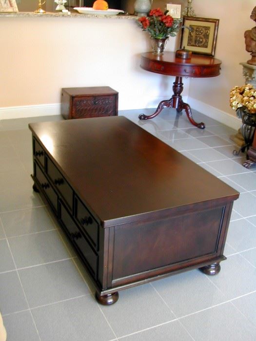 Coffee table with many drawers.