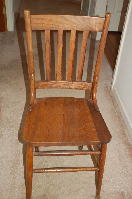 Antique straight back wooden chair.