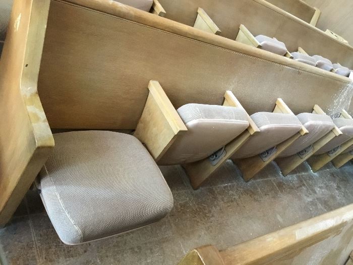 9 person flip down cushioned pews. 26 total. Located on Jarvis.  $250 each