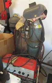 Oxy-acetylene welding tanks, face masks, Lincoln welding pistols and an electrical welder