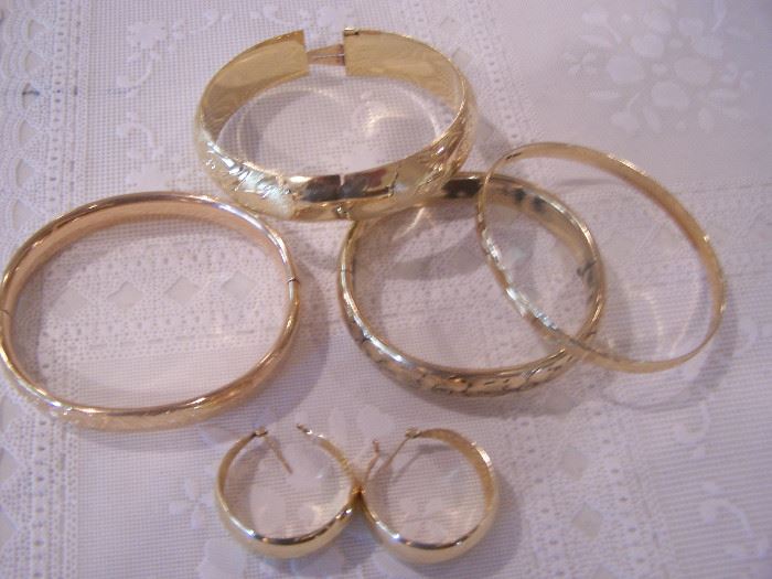gold bracelets & ear rings