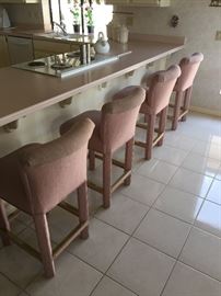 4 counter chairs, mauve in color